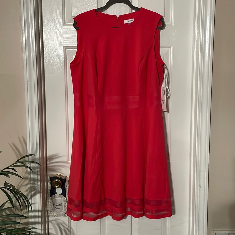 16w Calvin Klein salmon colored sleeveless dress.